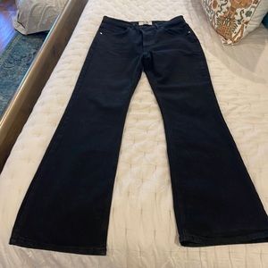 NWOT. Free people black flared jeans. Size 28